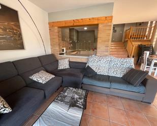 Sala d'estar de Casa adosada en venda en Canyelles amb Terrassa i Piscina
