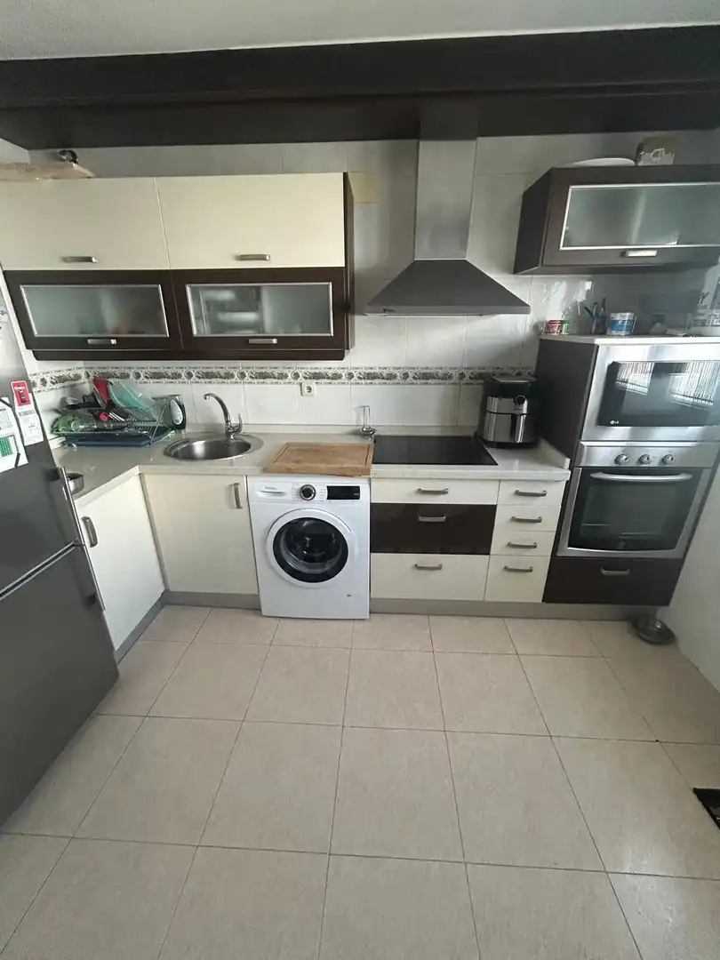 Cuina de Casa adosada en venda en San Andrés del Rabanedo amb Calefacció i Terrassa