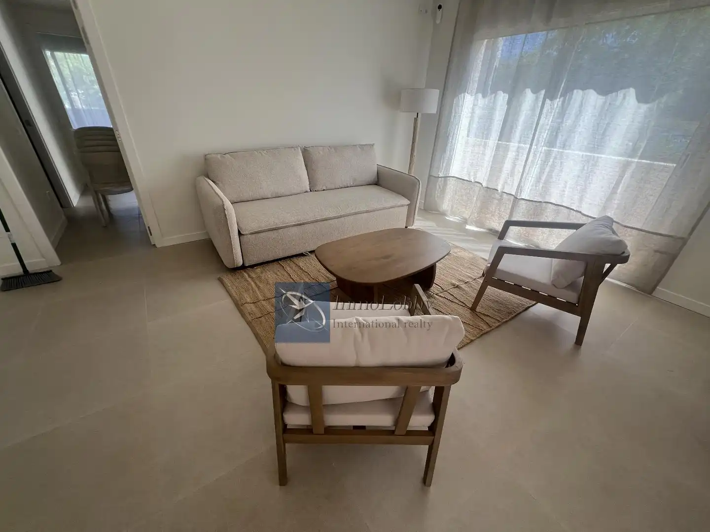 Sala d'estar de Apartament de lloguer en Castell d'Aro, Platja d'Aro i s'Agaró amb Aire condicionat, Terrassa i Piscina comunitària