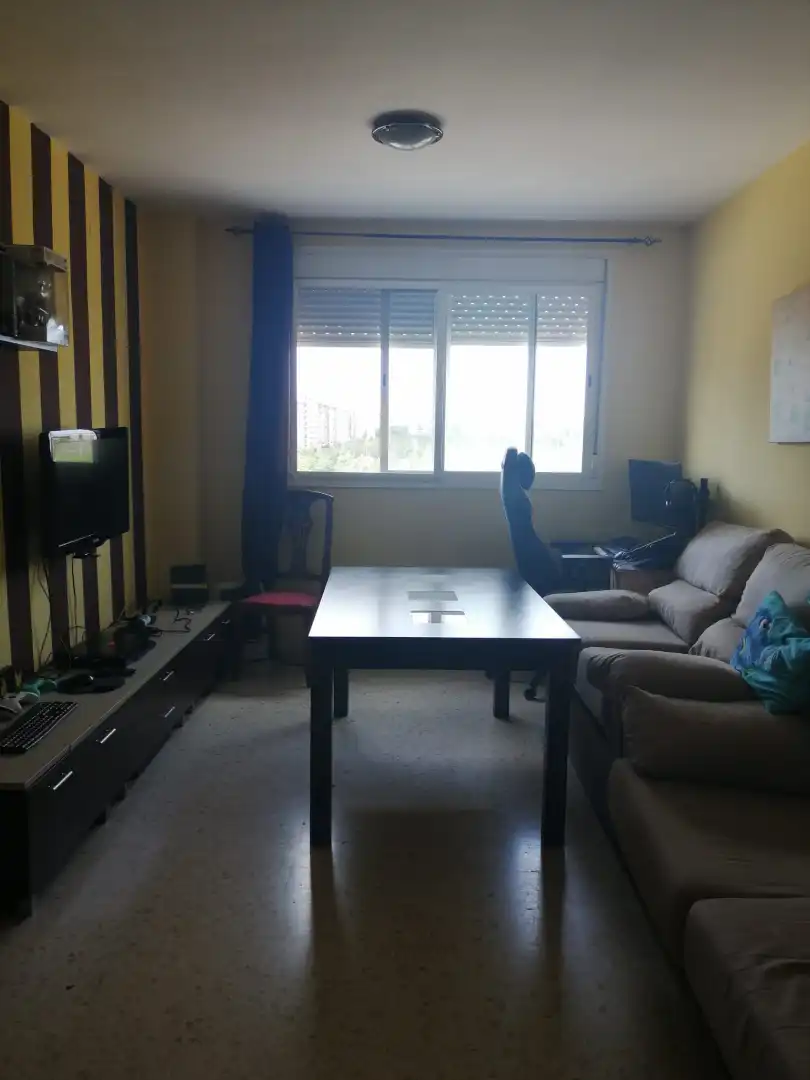 Sala d'estar de Pis de lloguer en Huelva amb Jardí privat, Moblat i Forn