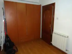 Schlafzimmer von Wohnung zur Miete in Gijón  mit Heizung, Parkett und Möbliert