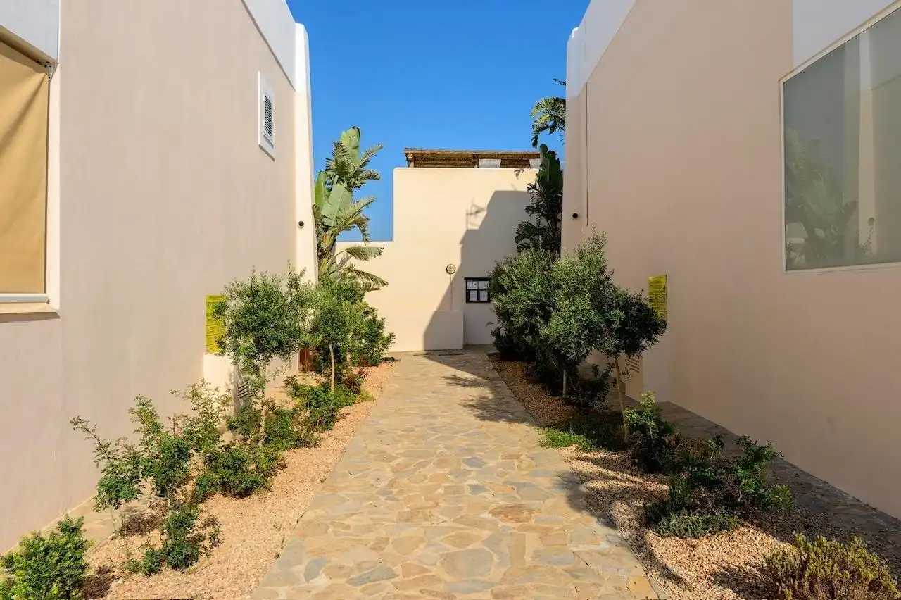 Exterior view of Detached homes for sale in Sant Josep de sa Talaia  with Air Conditioner, Heating and Private garden