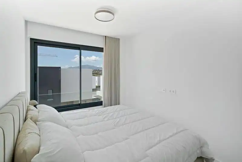 Habitación de Casa adosada de alquiler en Estepona con Aire acondicionado, Jardín privado y Terraza