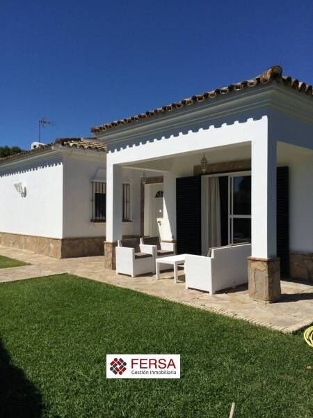 Terrassa de Casa o xalet de lloguer en El Puerto de Santa María amb Aire condicionat, Jardí privat i Piscina
