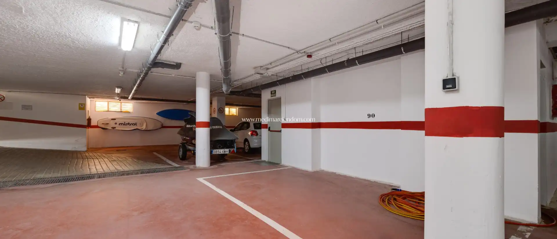 Parking of Duplexes for sale in La Manga del Mar Menor  with Air Conditioner, Heating and Private garden