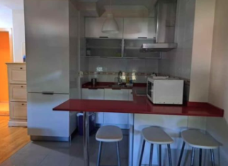 Kitchen of Flat for sale in Sanxenxo  with Heating, Parquet flooring and Storage room