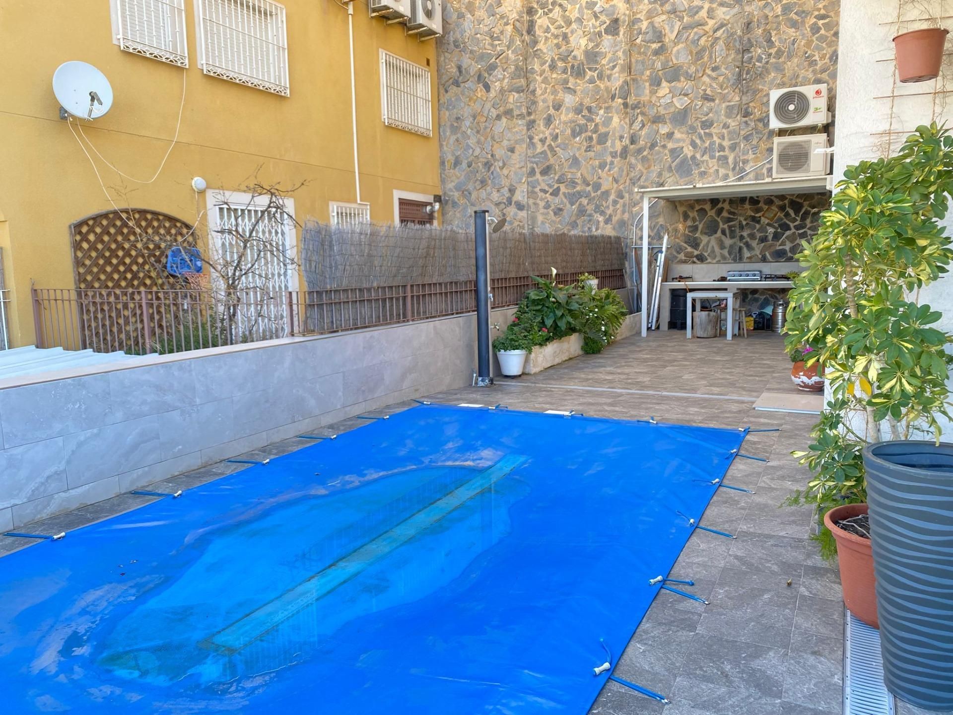 Piscina de Casa adosada en venta en Águilas con Aire acondicionado, Jardín privado y Parquet