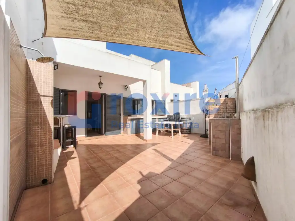 Vista exterior de Casa adosada en venda en Sant Josep de sa Talaia amb Aire condicionat, Terrassa i Piscina