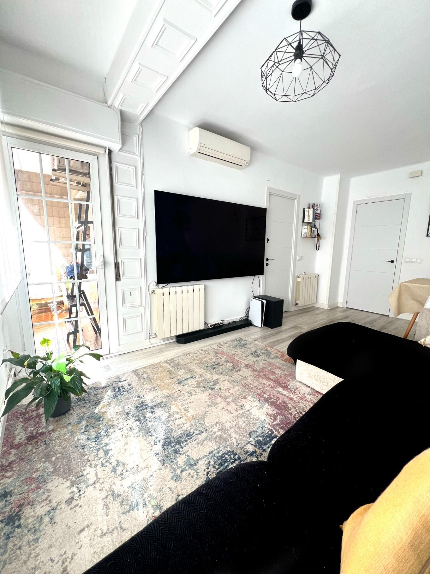 Living room of Flat for sale in Sabadell  with Air Conditioner, Heating and Terrace