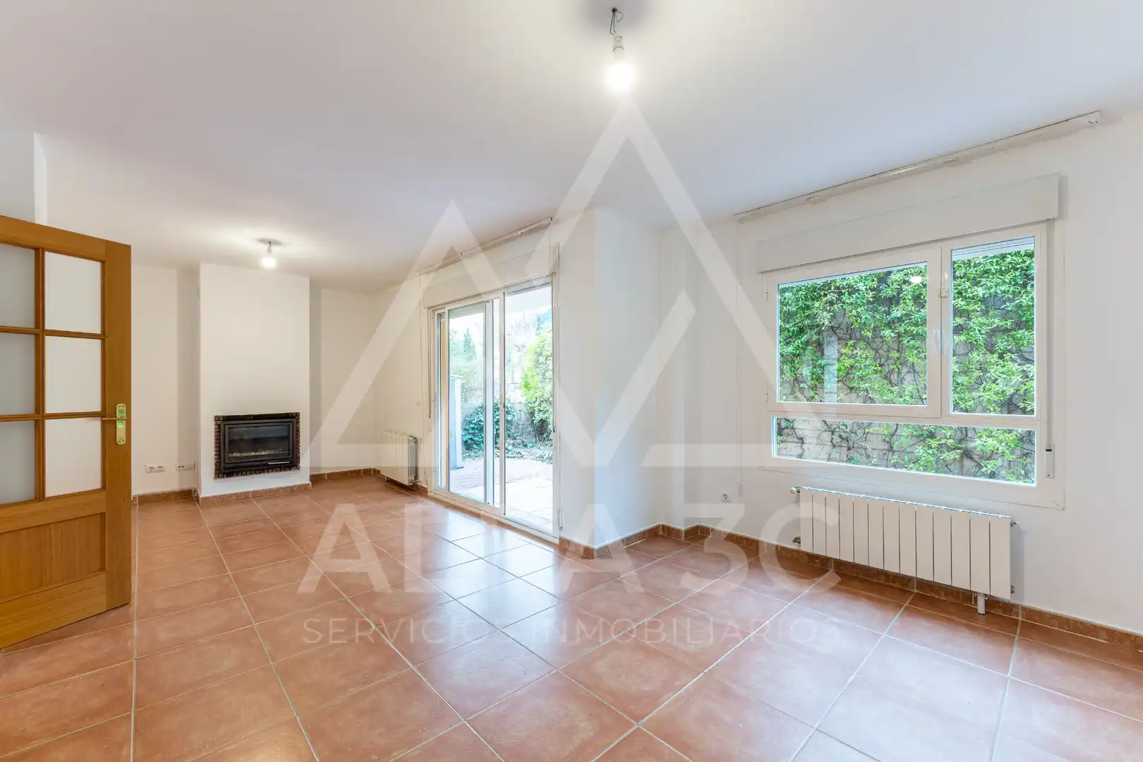 Sala de estar de Casa o chalet en venta en Venturada con Aire acondicionado, Calefacción y Jardín privado
