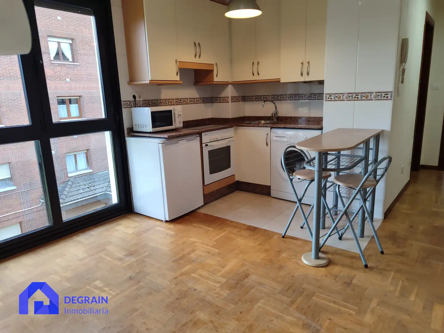 Kitchen of Flat for sale in Oviedo   with Heating, Parquet flooring and Storage room