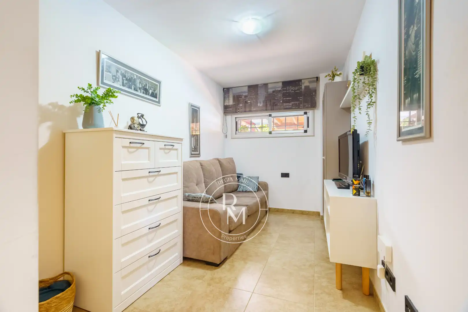 Sala de estar de Casa adosada en venta en Roda de Berà con Aire acondicionado, Calefacción y Jardín privado