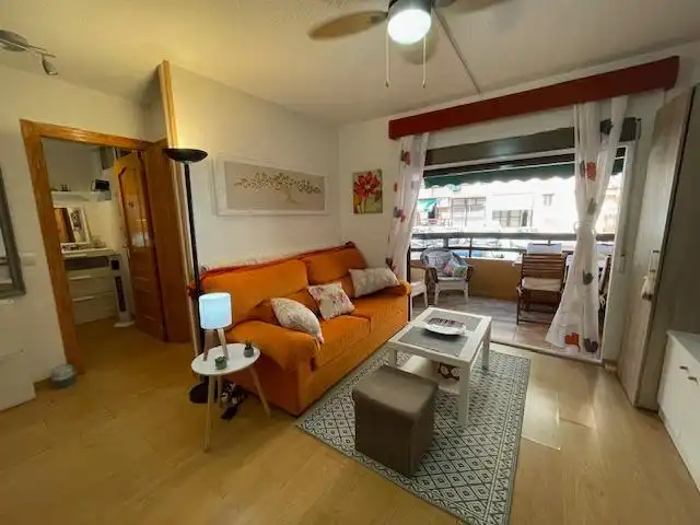 Sala de estar de Piso en venta en La Manga del Mar Menor con Balcón, Alarma y Piscina comunitaria