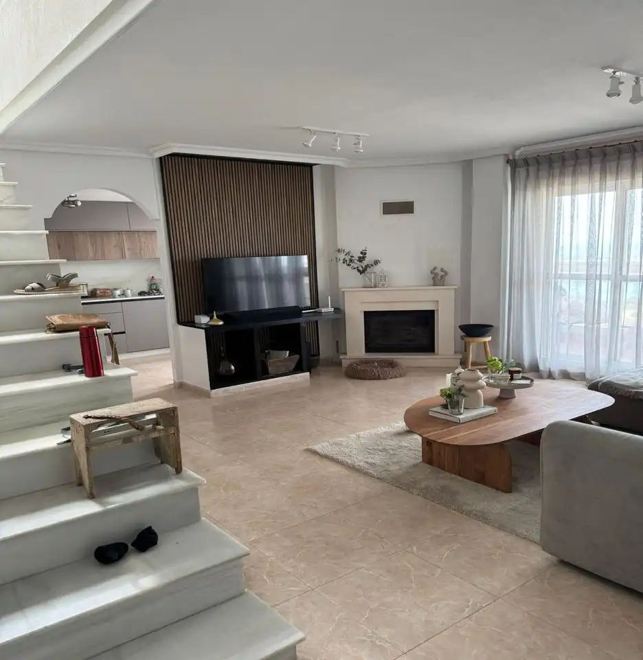 Sala de estar de Ático en venta en La Manga del Mar Menor con Aire acondicionado, Terraza y Piscina