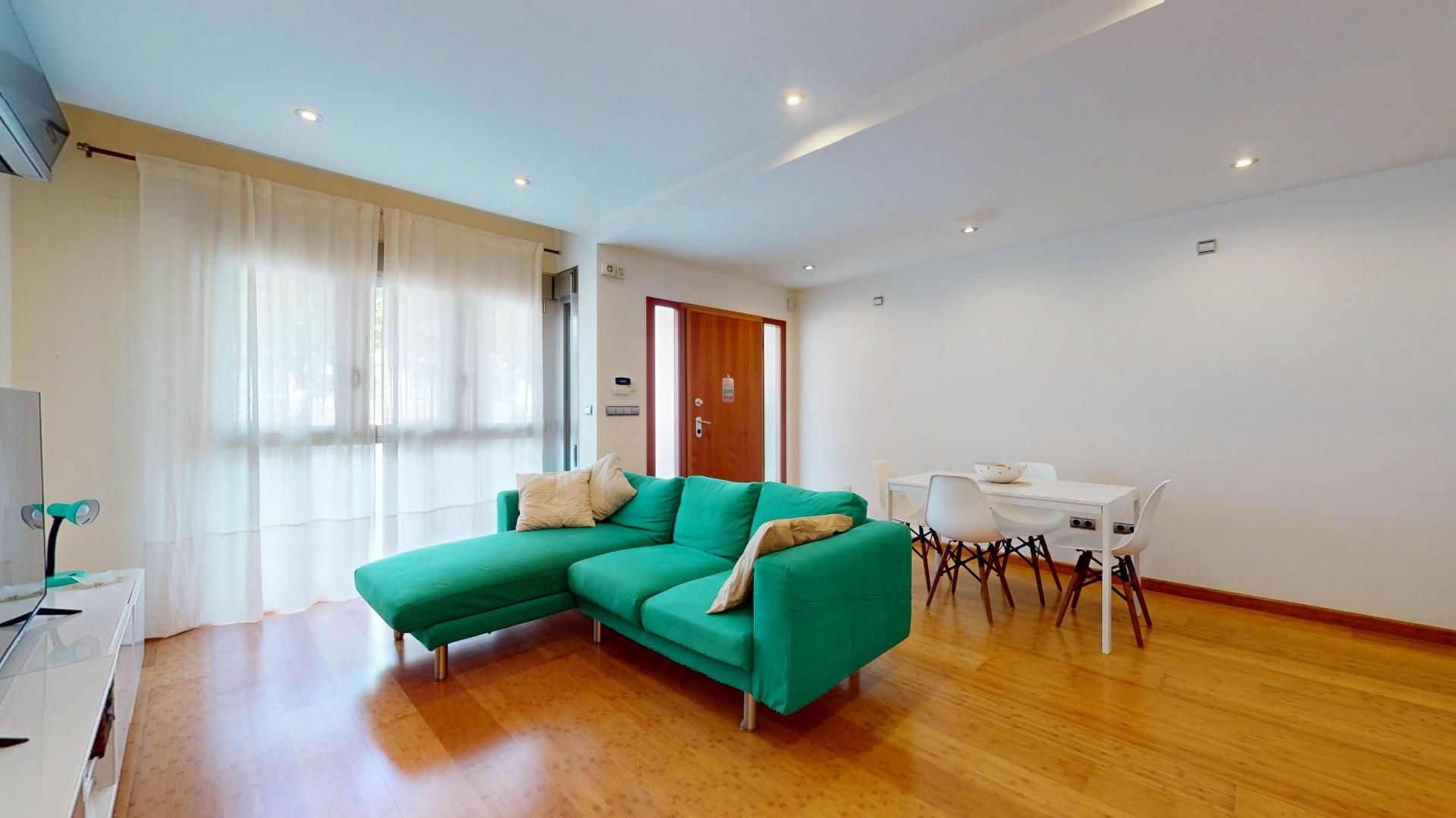 Sala d'estar de Casa adosada en venda en Pilar de la Horadada amb Aire condicionat, Jardí privat i Terrassa