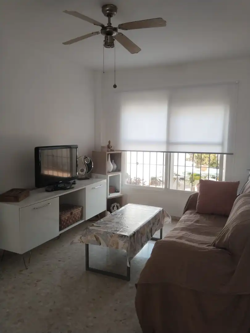 Sala de estar de Casa adosada en venta en Churriana