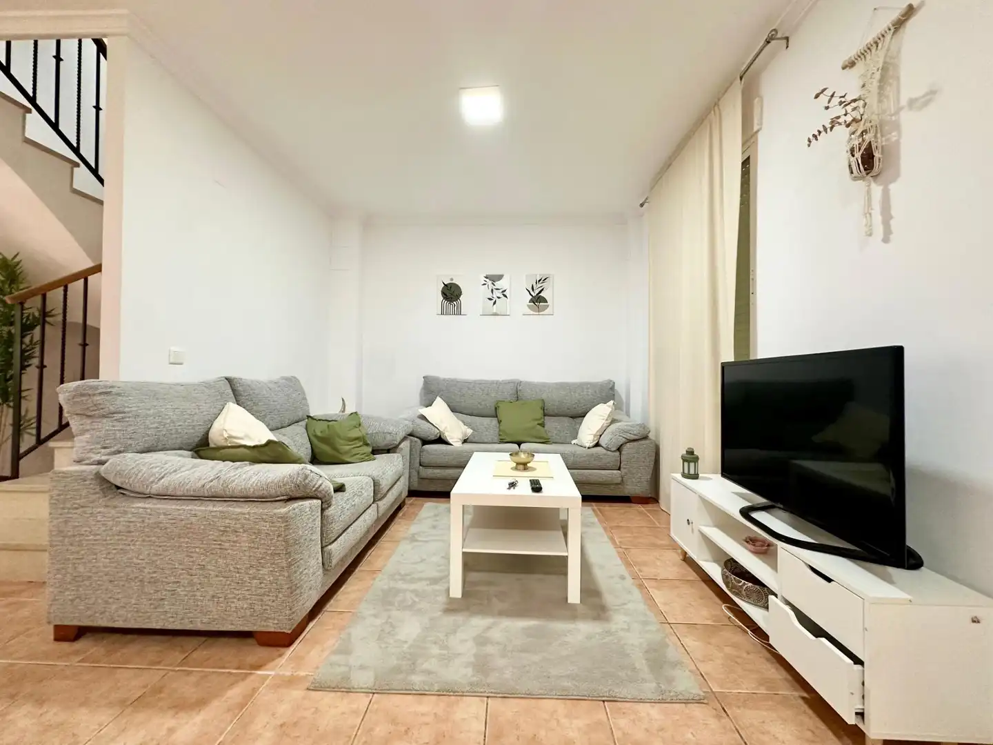 Sala d'estar de Casa adosada de lloguer en Alzira amb Jardí privat, Terrassa i Moblat