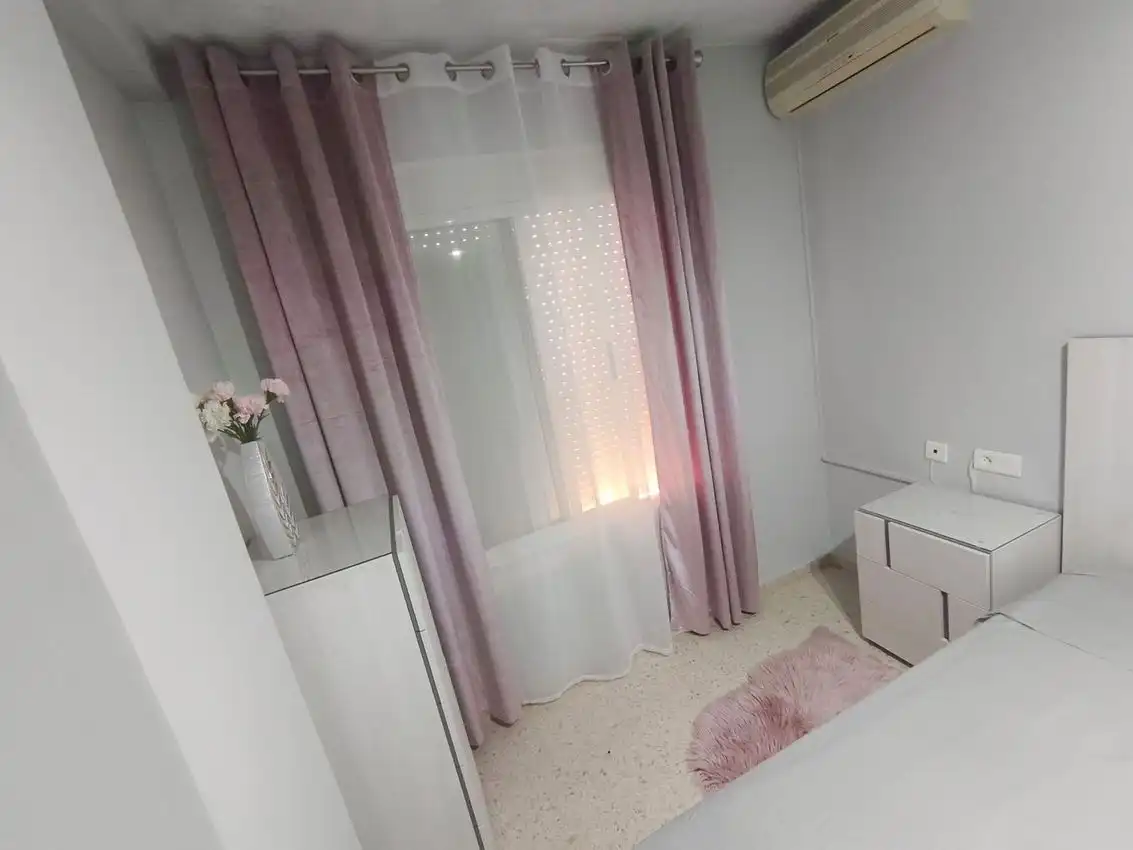Habitación de Casa adosada en venta en Cartaya con Aire acondicionado