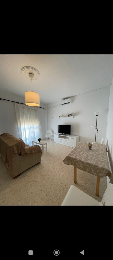 Living room of Flat to rent in Guillena  with Air Conditioner and Furnished