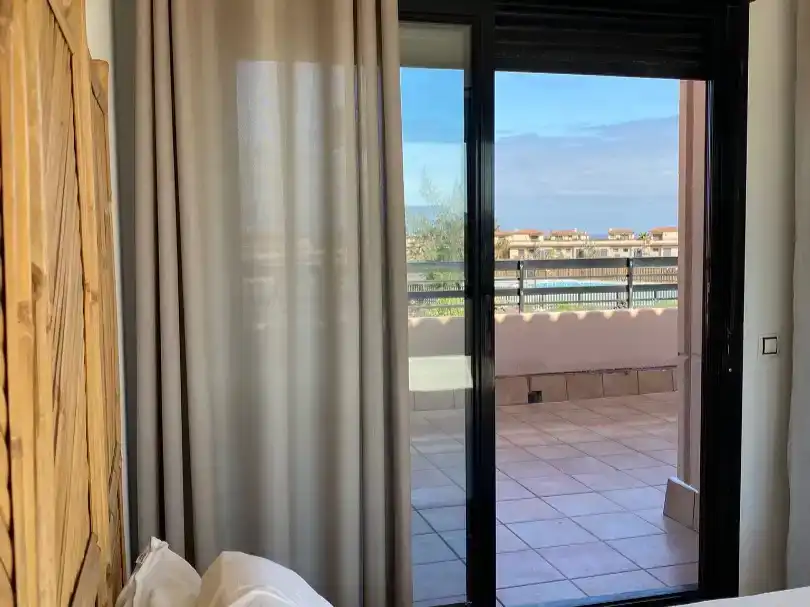 Dormitori de Casa adosada de lloguer en La Oliva amb Aire condicionat, Jardí privat i Piscina