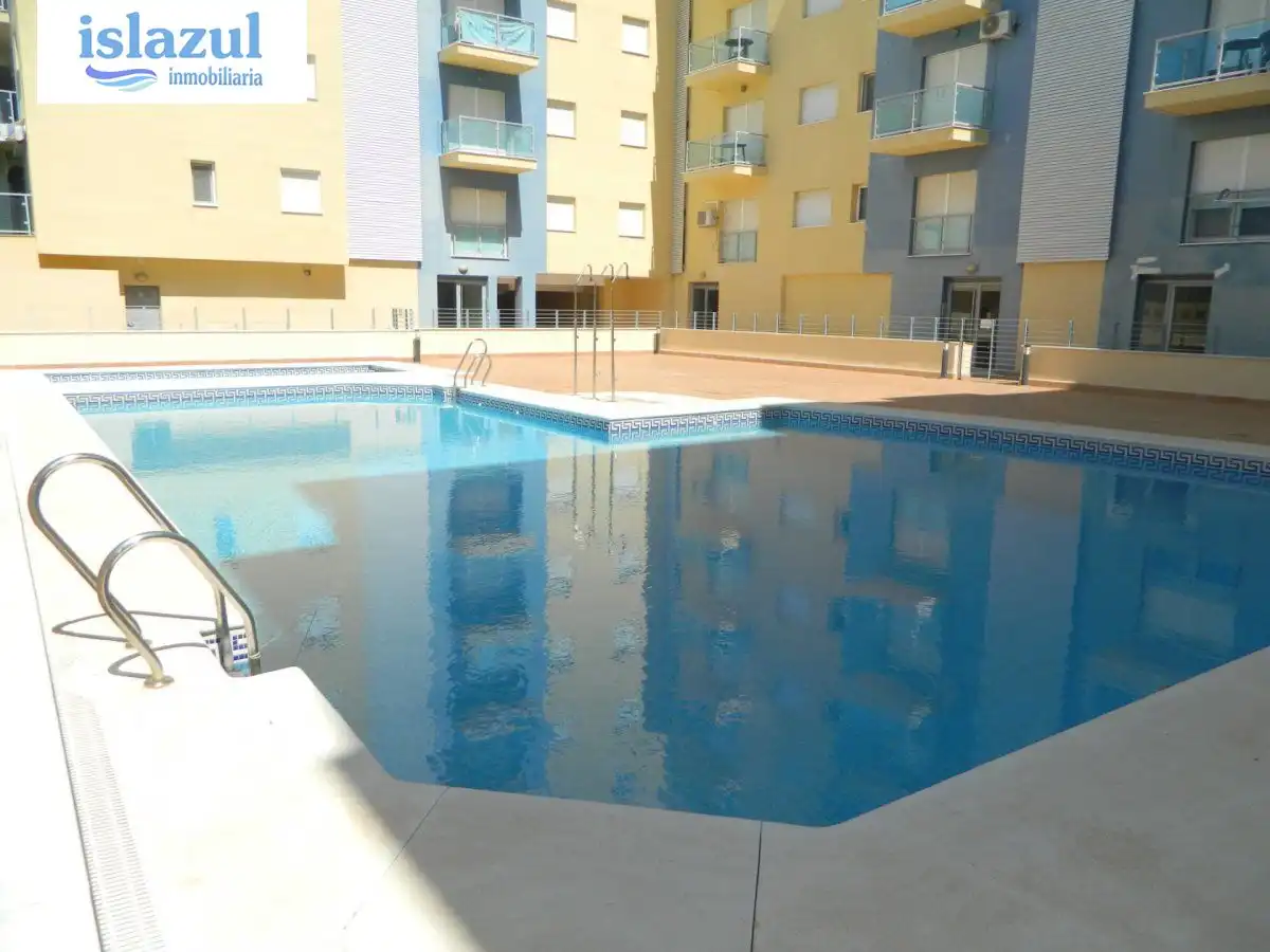 Piscina de Apartamento de alquiler en Isla Cristina con Aire acondicionado, Jardín privado y Terraza