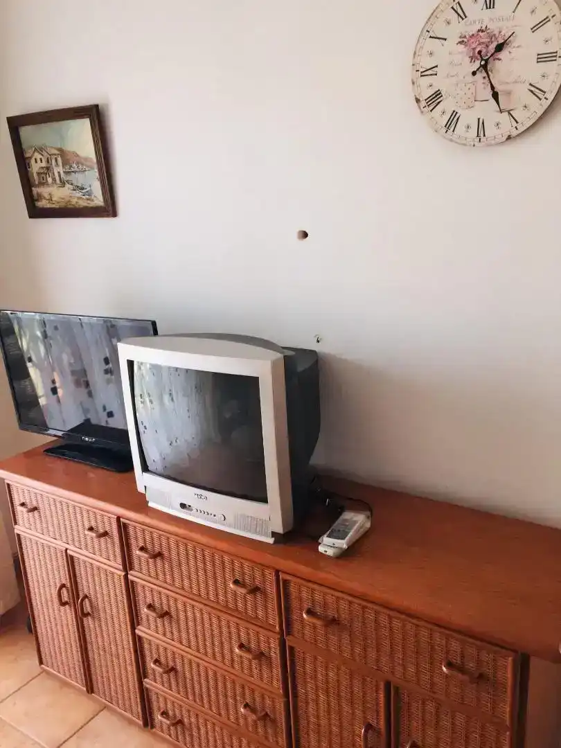 Living room of Flat for sale in L'Escala  with Air Conditioner and Balcony