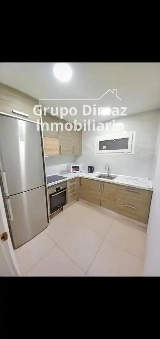 Cuina de Pis de lloguer en Palamós amb Terrassa i Moblat