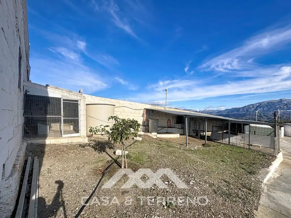 Vista exterior de Casa o chalet en venta en Macharaviaya con Aire acondicionado, Jardín privado y Terraza