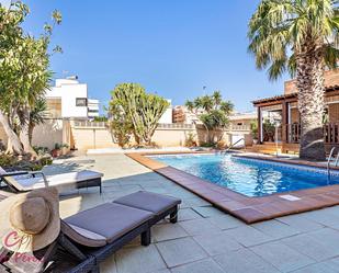 Swimming pool of House or chalet for sale in Roquetas de Mar  with Air Conditioner, Terrace and Swimming Pool