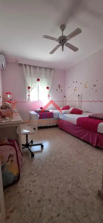 Habitación de Casa adosada en venta en Utrera con Aire acondicionado y Trastero