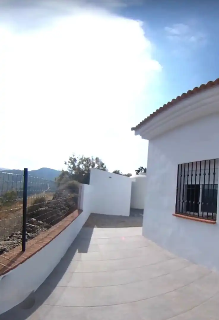 Vista exterior de Finca rústica en venda en El Borge amb Jardí privat, Terrassa i Traster