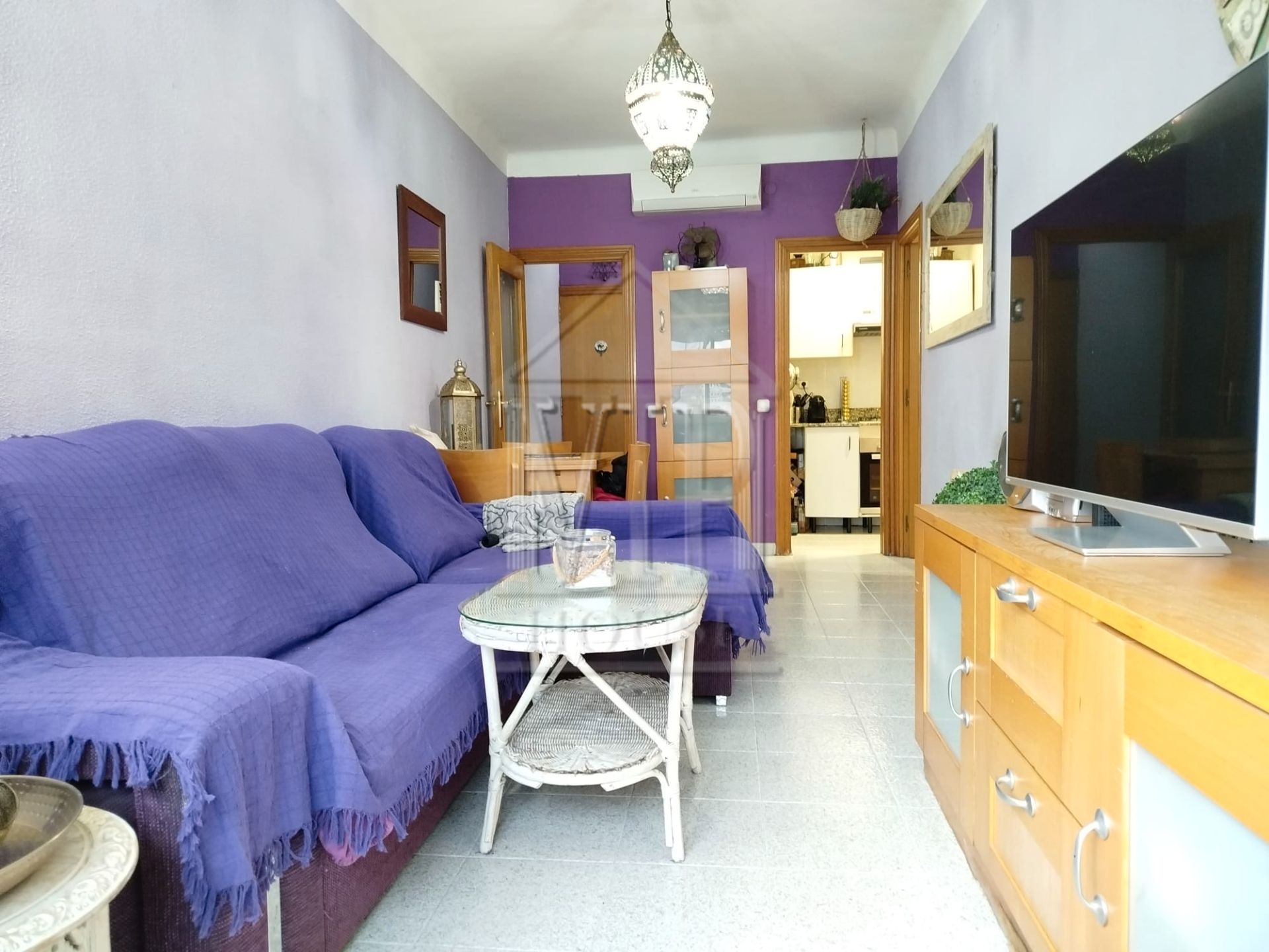 Sala d'estar de Pis en venda en Badalona amb Aire condicionat i Moblat