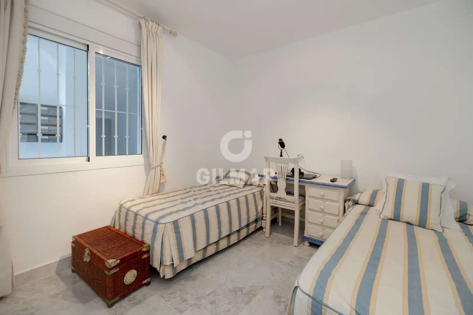 Schlafzimmer von Wohnungen zum Verkauf in Marbella mit Heizung, Privatgarten und Schwimmbad
