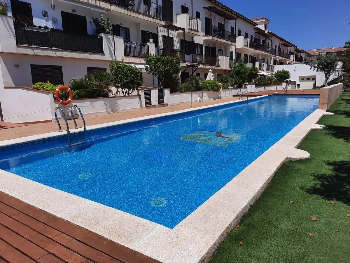 Piscina de Apartament en venda en Sant Jaume d'Enveja amb Moblat, Balcó i Piscina comunitària