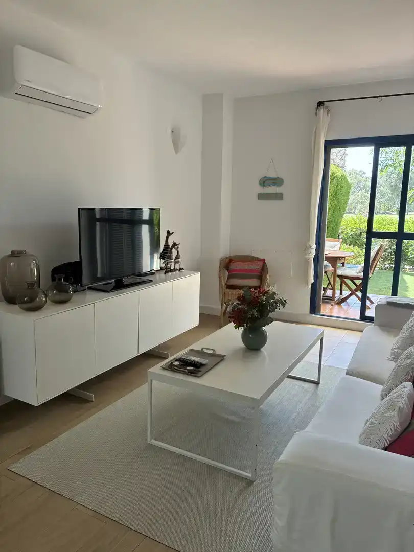 Sala de estar de Dúplex de alquiler en Rota con Aire acondicionado, Jardín privado y Piscina