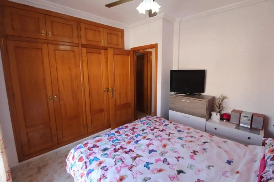 Dormitori de Casa adosada en venda en Orihuela amb Jardí privat, Terrassa i Moblat