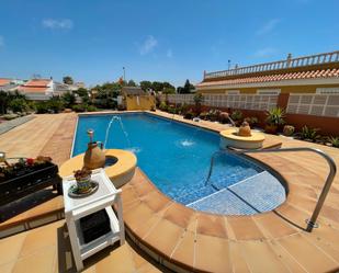 Swimming pool of House or chalet for sale in  Almería Capital  with Air Conditioner, Terrace and Swimming Pool