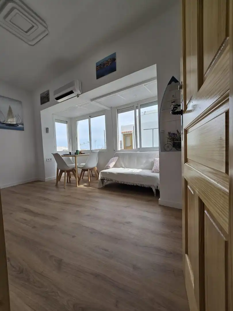 Living room of Attic for sale in L'Ametlla de Mar   with Air Conditioner, Heating and Parquet flooring