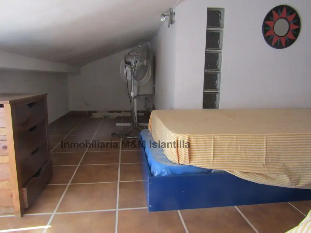 Habitación de Casa adosada en venta en Islantilla con Terraza, Trastero y Amueblado