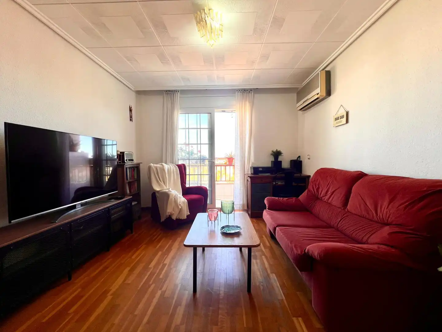 Sala de estar de Piso en venta en Tavernes Blanques con Aire acondicionado, Calefacción y Parquet