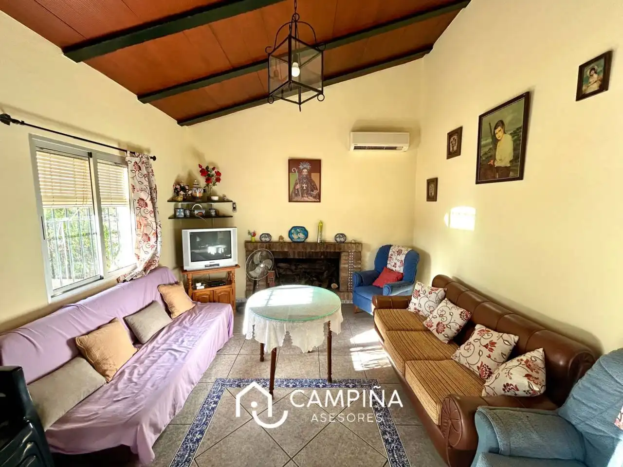 Sala de estar de Finca rústica en venta en Trigueros con Aire acondicionado, Terraza y Piscina