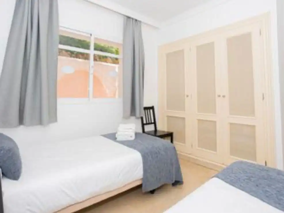 Dormitori de Apartament de lloguer en Nueva Andalucía