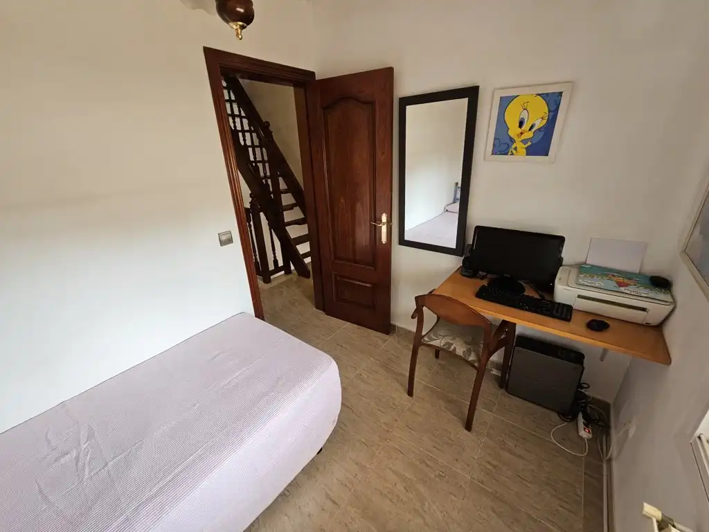Schlafzimmer von Einfamilien-Reihenhaus zum Verkauf in Calafell mit Klimaanlage, Heizung und Privatgarten