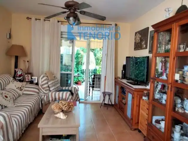 Sala de estar de Casa adosada en venta en Islantilla con Piscina comunitaria