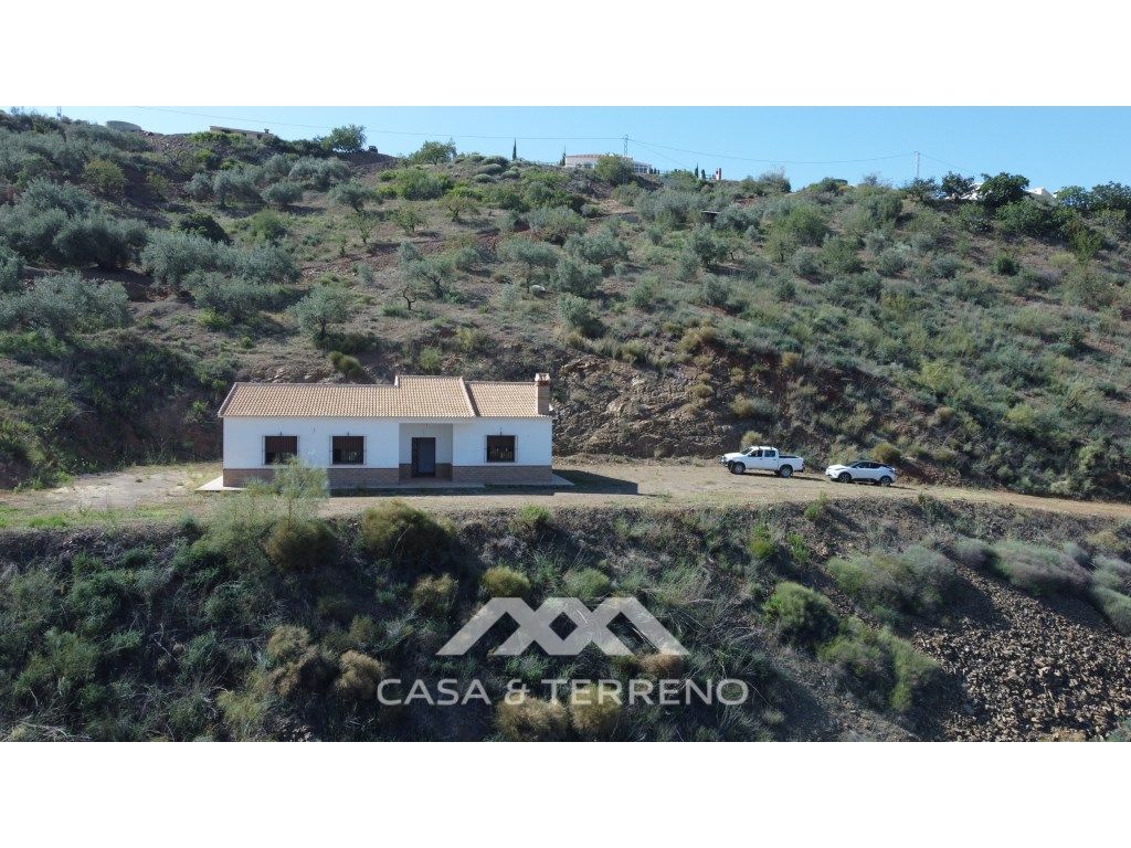 Vista exterior de Casa o xalet en venda en Colmenar amb Aire condicionat