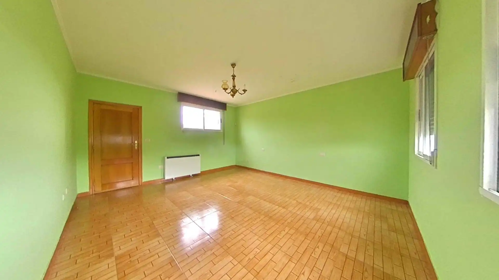 Wohnzimmer von Einfamilien-Reihenhaus zum Verkauf in Os Blancos  mit Heizung