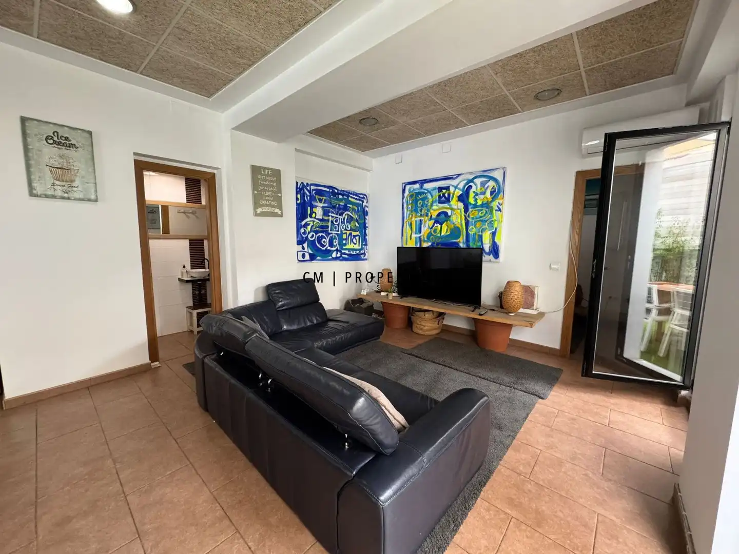 Sala d'estar de Casa adosada en venda en Valencia amb Aire condicionat, Terrassa i Traster