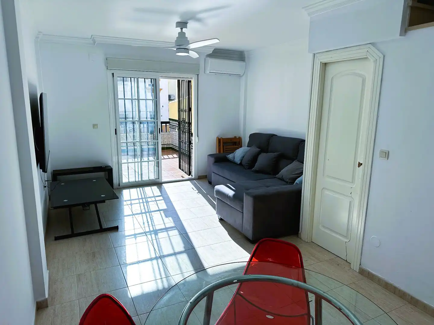Sala de estar de Casa adosada en venta en Salobreña con Aire acondicionado, Calefacción y Terraza
