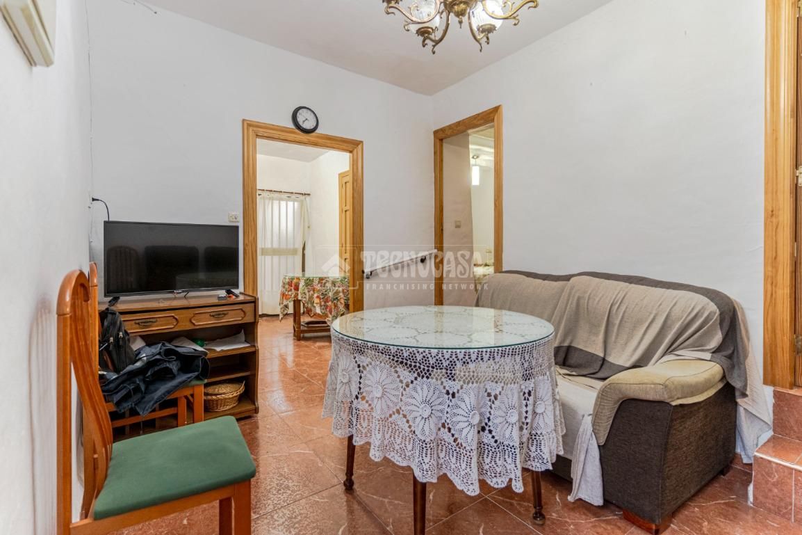Sala d'estar de Casa adosada en venda en Molvízar amb Jardí privat i Terrassa