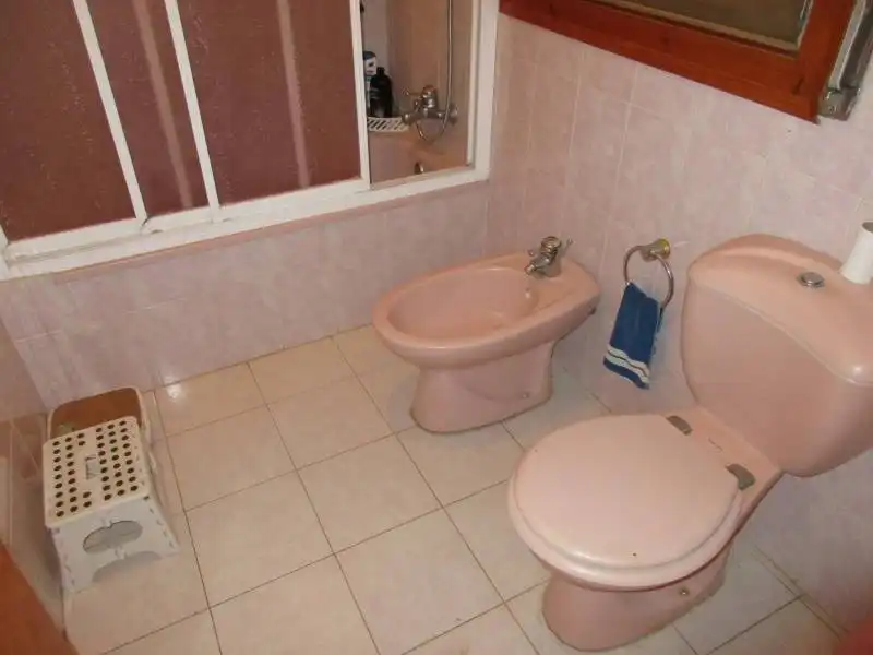 Bany de Casa o xalet en venda en L'Aldea amb Aire condicionat, Jardí privat i Terrassa
